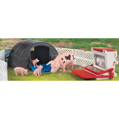 Big Country Toys Pig Hut Adventure playset with black hut, pink pigs, and red farm accessories