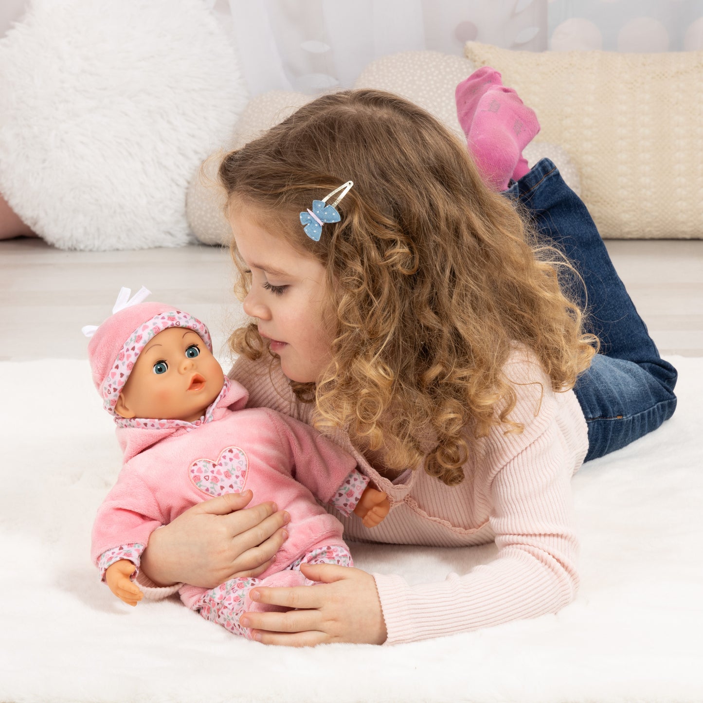 First Words Baby Doll 15-Inch with Sounds in pink outfit with heart design