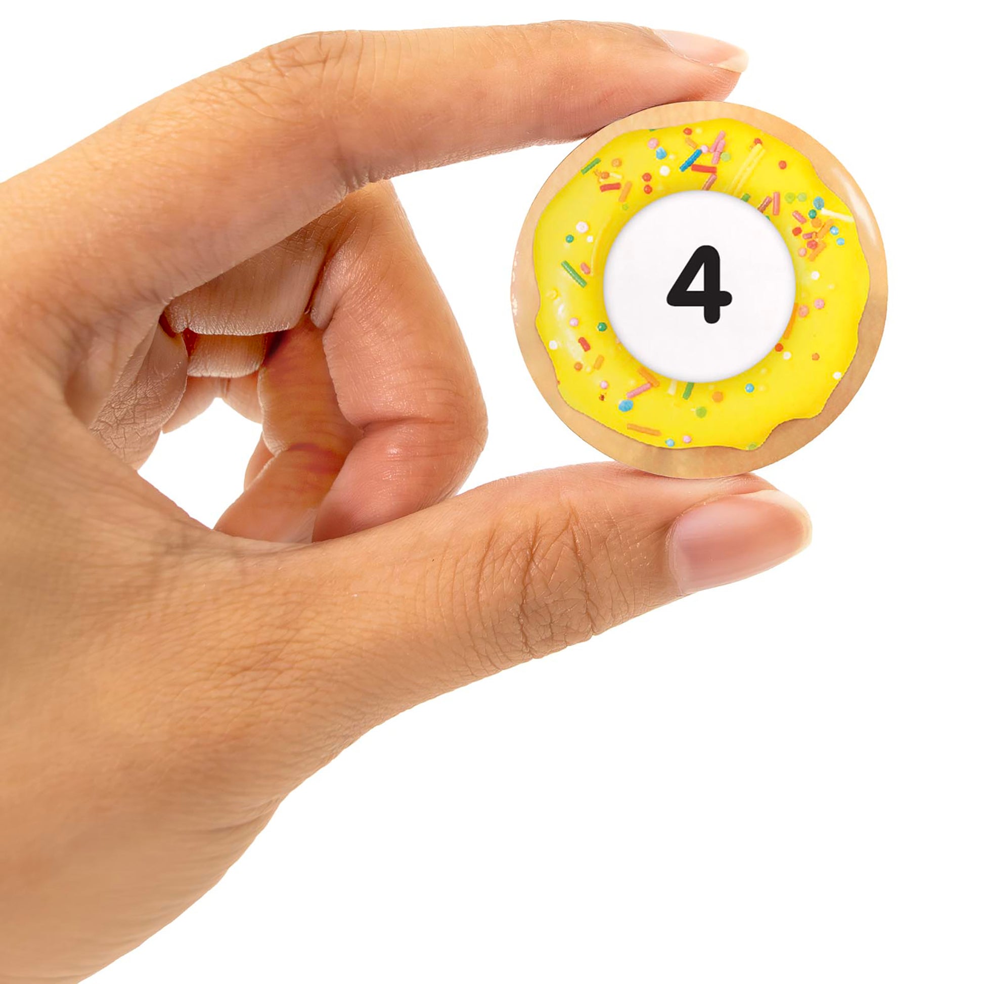Snacks: Multiplication toy donut with number 4, yellow frosting and colorful sprinkles