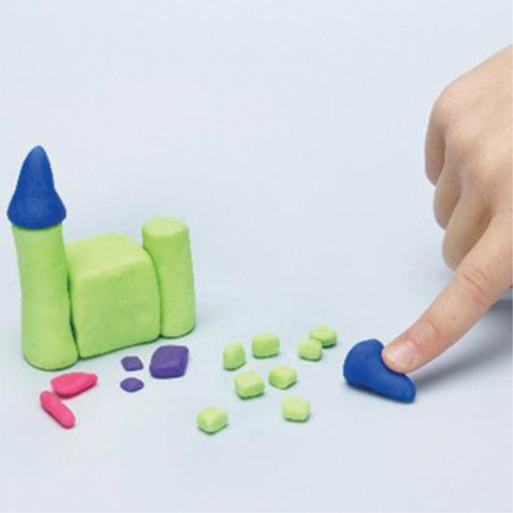 how to make a castle with PlayDoh dough compound step two