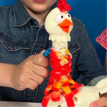 PlayDoh Cluck-A-Dee chicken with colorful feathers