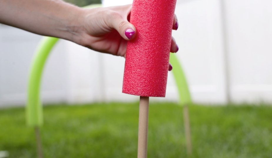 pool noodle attached to dowel